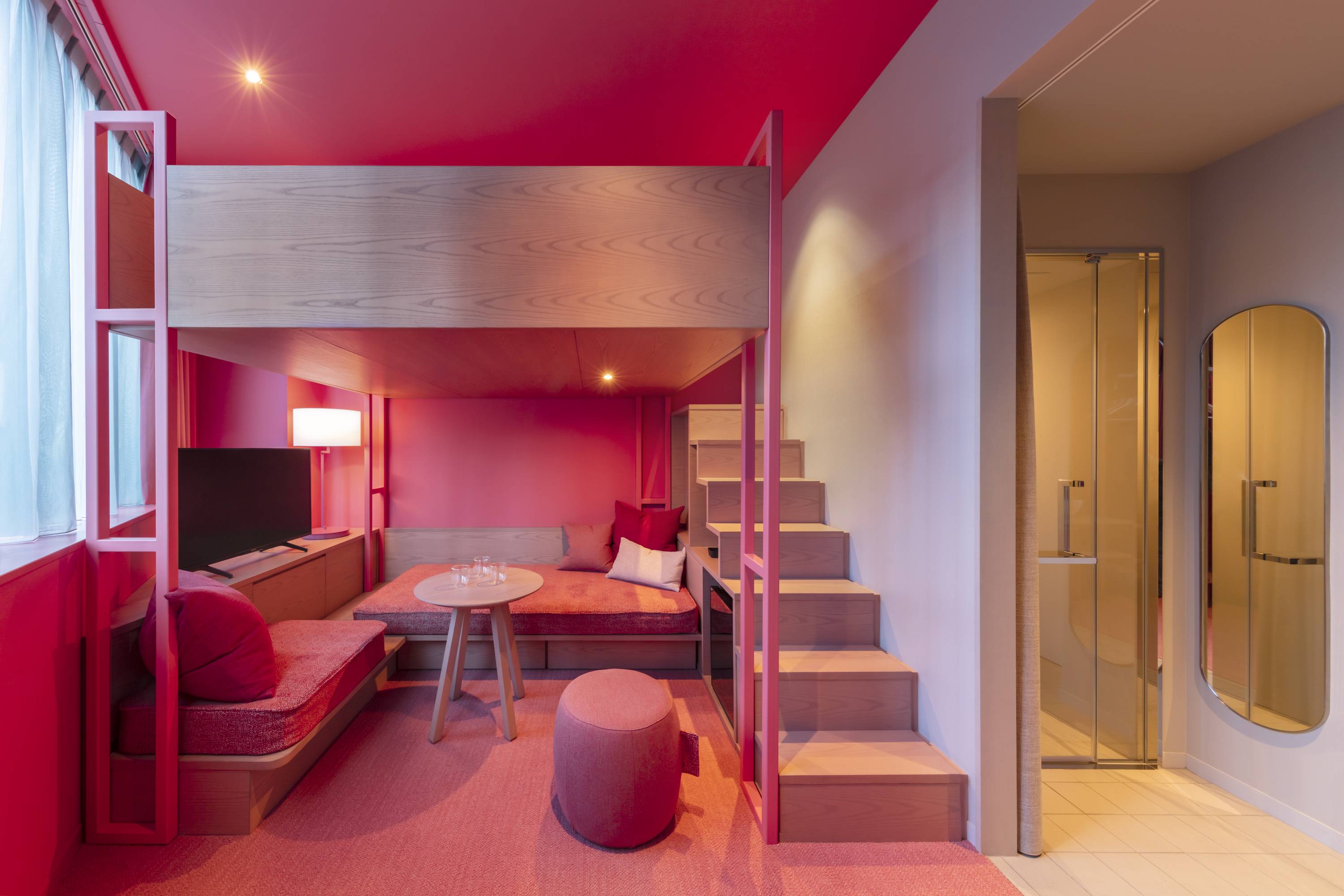 Toggle Hotel’s rooms are two-tone, each with furniture matching the bicolor palette.