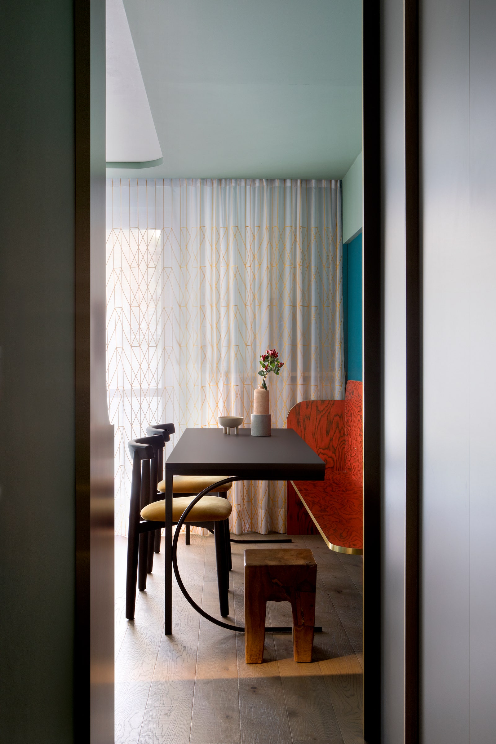The two Claretta chairs are by Miniforms and the Chainette curtains are by Ronan and Erwan Bouroullec for Kvadrat.