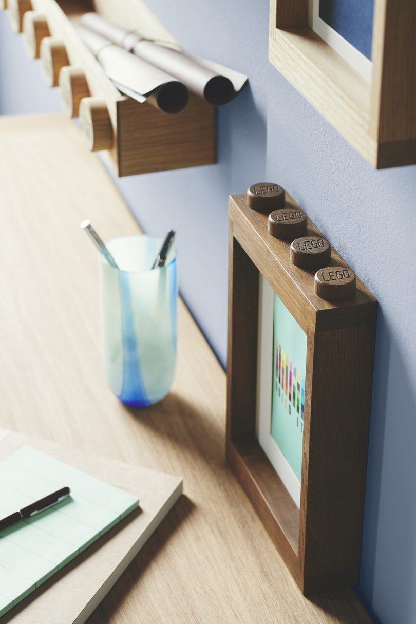 wooden Lego photo frame on desk