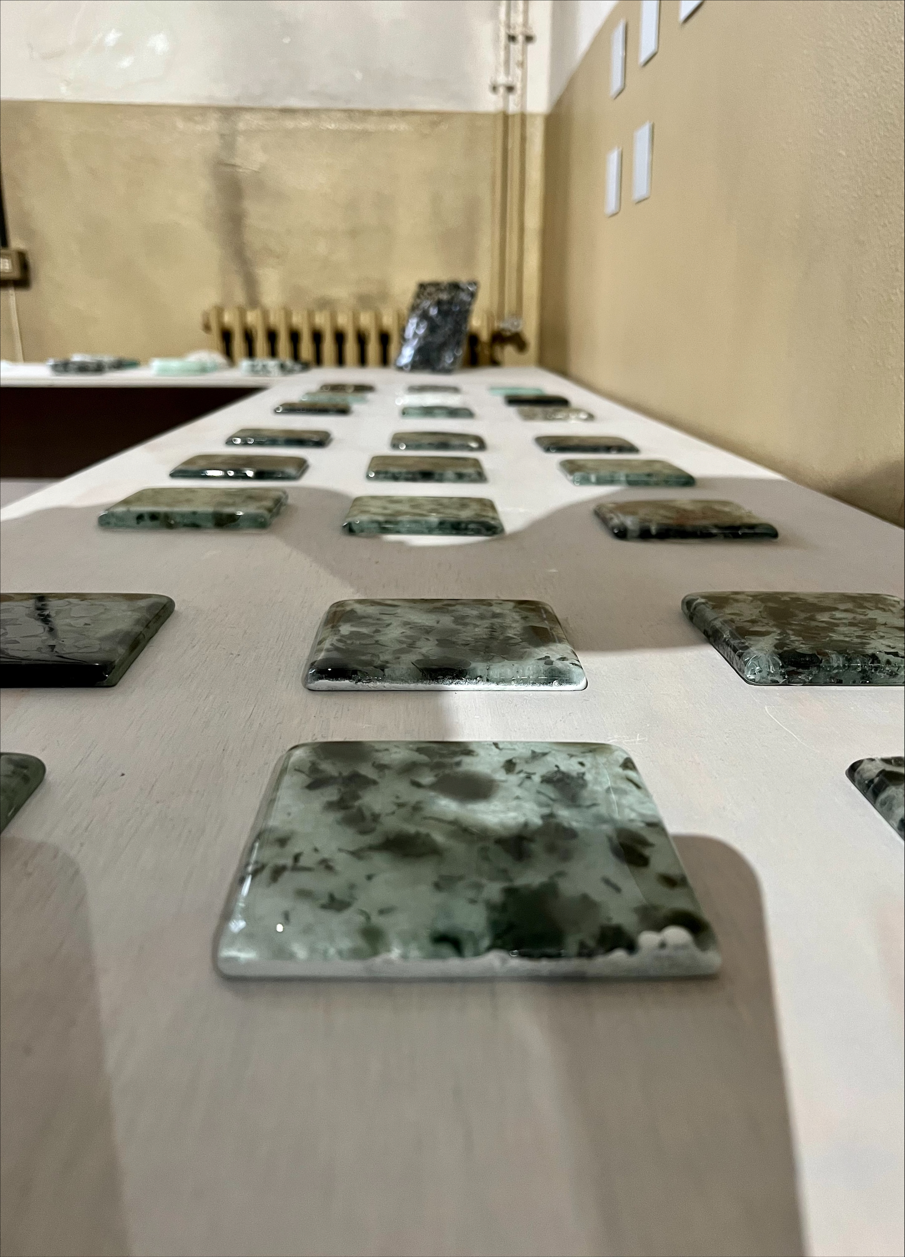 Image of a bunch of tiles on a table in a room