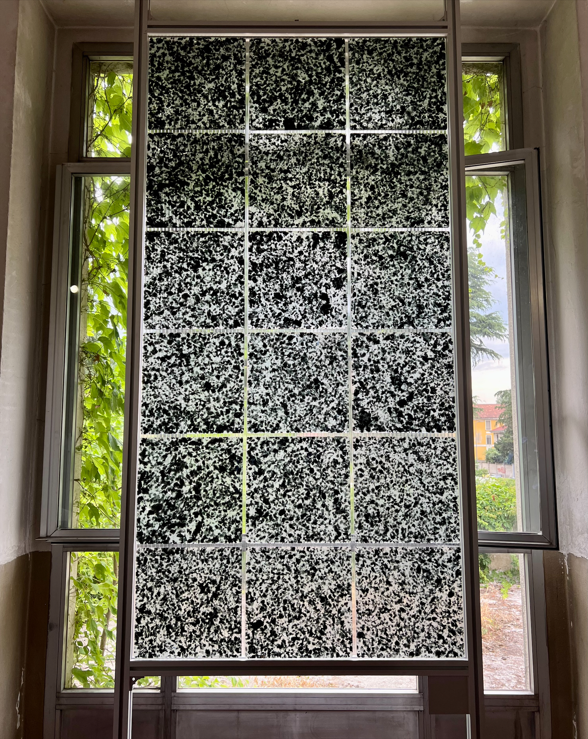 Image of translucent glass tiles in front of a window